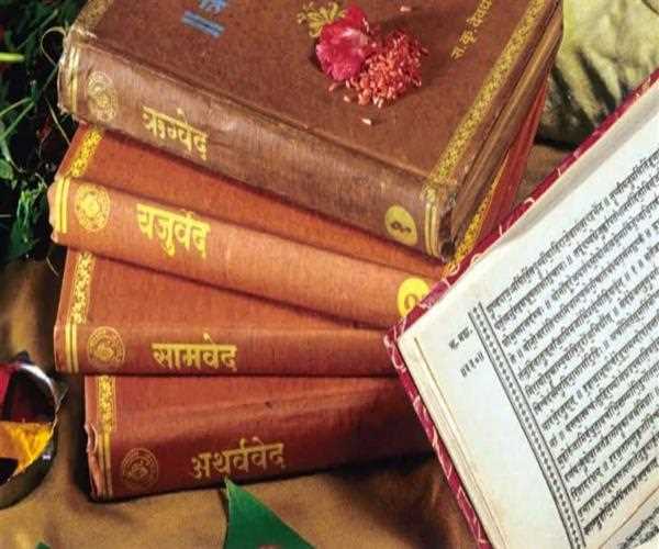 What is the main theme of the Indian Vedas?