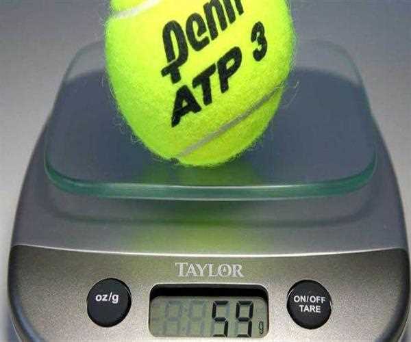 What is the weight of a tennis ball ?