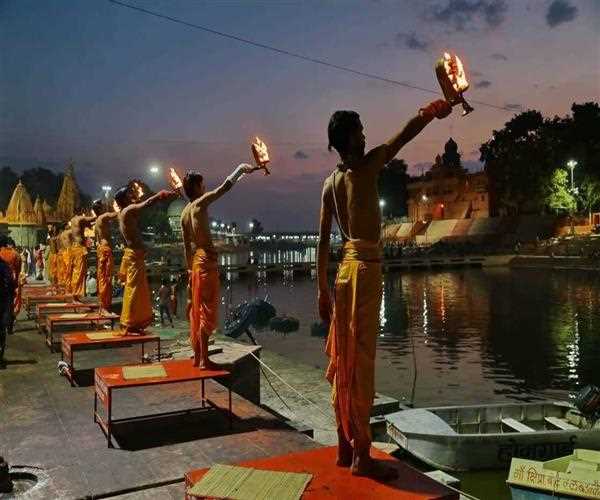 What is the benefit of attending Kumbh Mela?