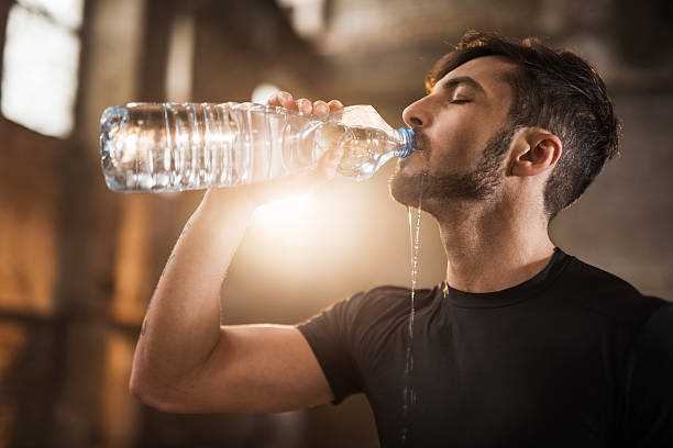 What is the benefit of drinking water after waking up?